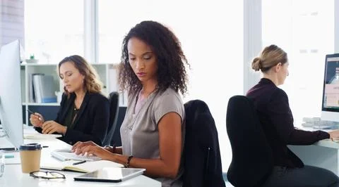 Woman, typing and computer with notes in office for project, review or tabl.. Stock Photos