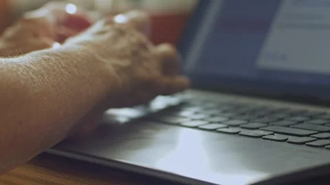A woman typing a comment and posting it on socail media Stock Footage 336009024