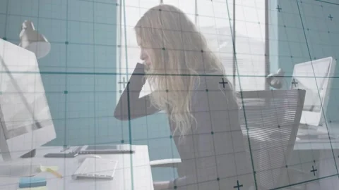 Woman typing on computer editing documents and rubbing forehead then resting on Stock Footage 320213287