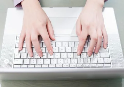 Woman typing on computer, elevated view Stock Photos