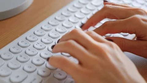 Woman typing on computer keyboard. Closeup 4k footage Видео 128197985