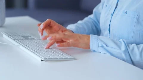 Woman typing on a computer keyboard. Concept of remote work. Stock Footage 131379338