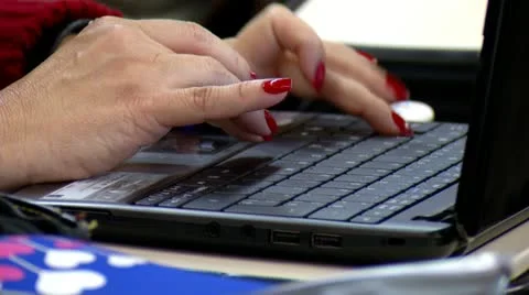 Woman Typing On A Computer Keyboard Video stock 12658965