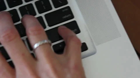 Woman typing on a computer keyboard Video stock 22755227