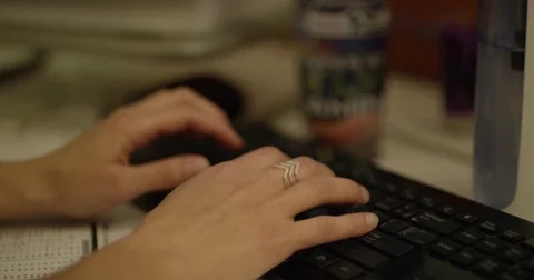 Woman Typing on Computer Keyboard Stock Footage 79433850