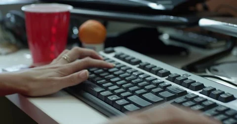Woman Typing on Computer Keyboard 動画素材 79435518