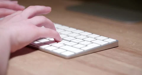 Woman typing on computer keyboard Stock Footage 276226335