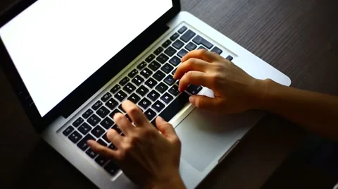 Woman typing on a computer at night Stock Footage 46263843