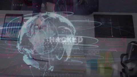 Woman typing at desk, causing rotating digital globe and HACKED alert, revealing Stock Footage 333704198