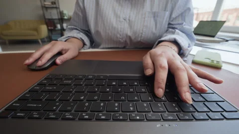Woman Typing on Keyboard and Using Mouse in Modern Office Stock-Footage 341561444
