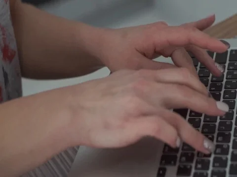 Woman typing on keyboard Stock Footage