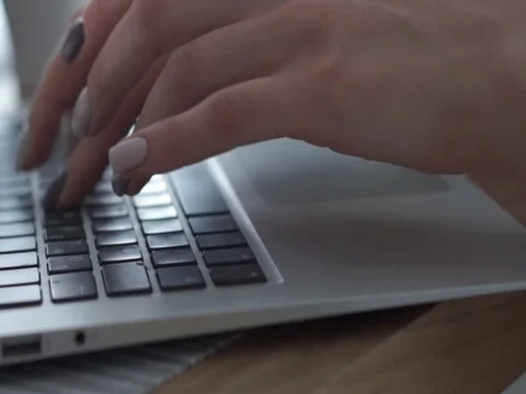 Woman typing on keyboard Stock Footage