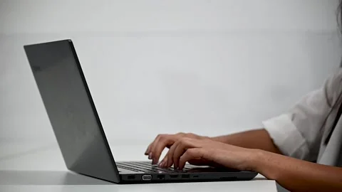 Woman typing on a keyboard Stock Footage 234782954