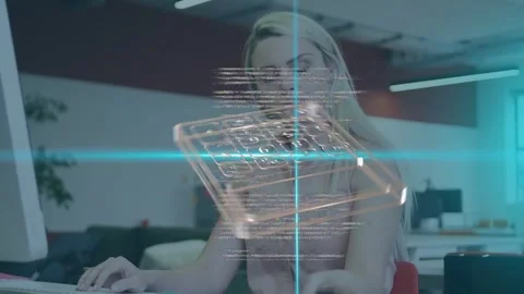 Woman typing on keys in office causing hologram keypad scrolling code overlays Stock Footage 335255315