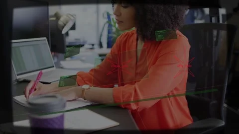 Woman typing laptop, causing HUD overlays aligning wrist while writing notes for Stock Footage 333526072