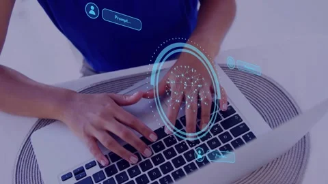 Woman typing laptop at table, causing tech HUD pulsing network and prompt chips, Stock Footage 334728854