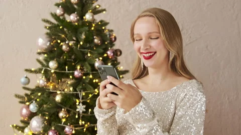 Woman typing message on mobile phone texting congratulates Stock Footage 166323249