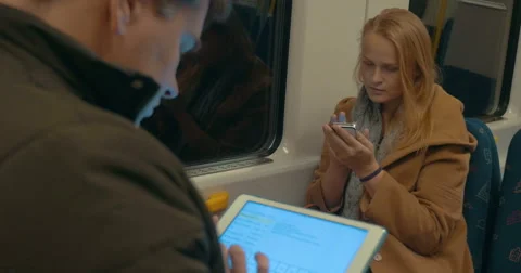 Woman Typing in Smartphone while Riding the Subway 스톡 동영상 57231272