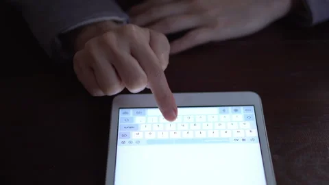 Woman Typing on Tablet Stock Footage 143469273