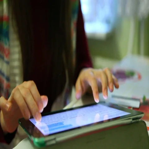 Woman typing text on keyboard in internet online on tablet Stock Footage 69294853