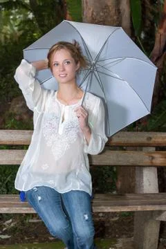 Woman with umbrella Stock Photos