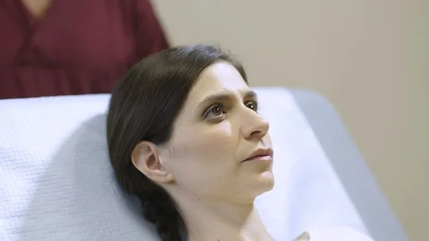Woman undergoing TMS Video stock 105257692