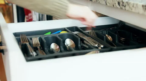 Woman unloading a dishwasher Stock Footage 36177341