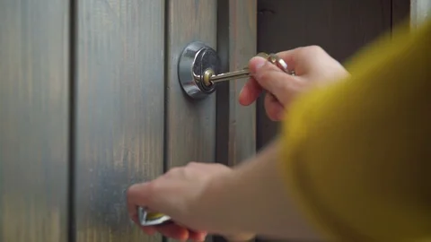 Woman Unlocking Entrance Door With A Key Stock Video Pond5