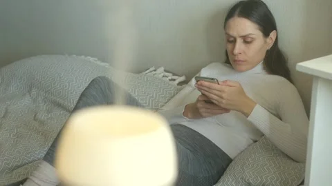 Woman use diffuser Stock Footage 322165687