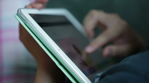 Woman use mobile device while relaxing on a sofa. Stock Footage 64050618