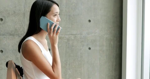 Woman use of mobile phone Stock Footage