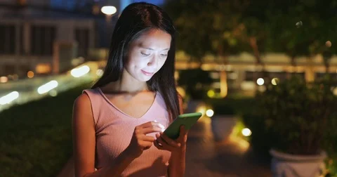 Woman use of mobile phone for internet Stock Footage