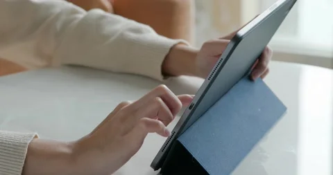 Woman use of tablet computer Stock Footage 131279624