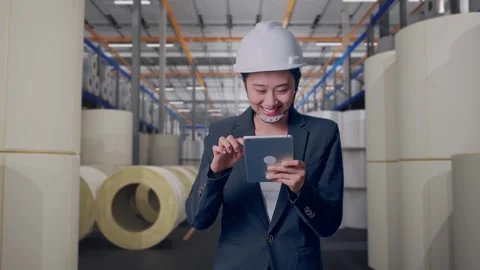 Woman Use Tablet While Walking at Polymer Plant Stock Footage 334520302