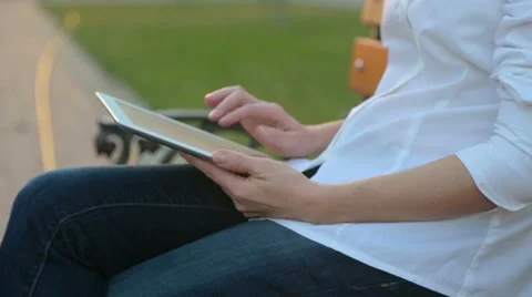 Woman uses the tablet pc Stock Footage 42935452