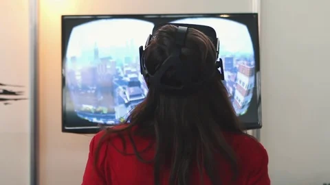 Woman Uses Virtual Reality Glasses Stock Footage 82021753