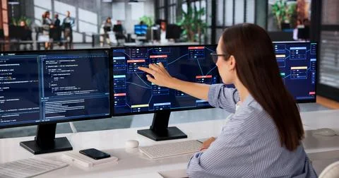Woman Uses Visual Software, Building Node-based Solutions For Digital Project Stock Photos