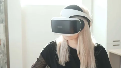 Woman using 3D virtual reality headset. Stock Footage 73852812