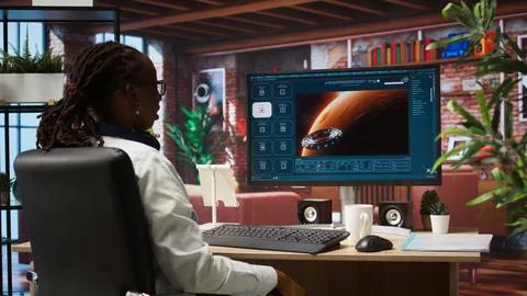 Woman using AI program turning text prompt into videos, pleased by results 库存照片