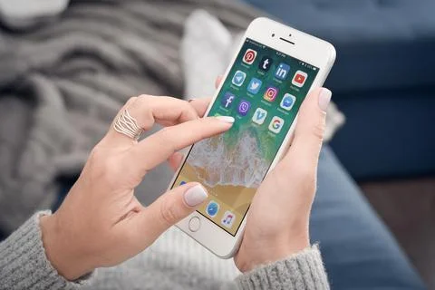 Woman using  Apple iPhone 8 plus Stock Photos