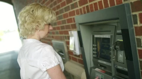 Woman Using ATM Stock Footage 22772346