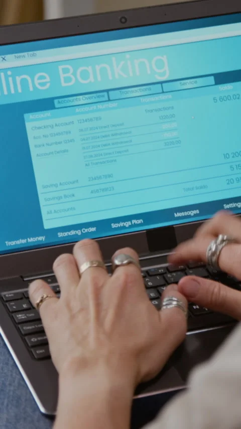 Woman using Banking and Typing on Computer Keyboard Vertical Stock Footage 327685368