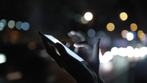 A woman Using Cellphone At Night Stock Footage 239020122
