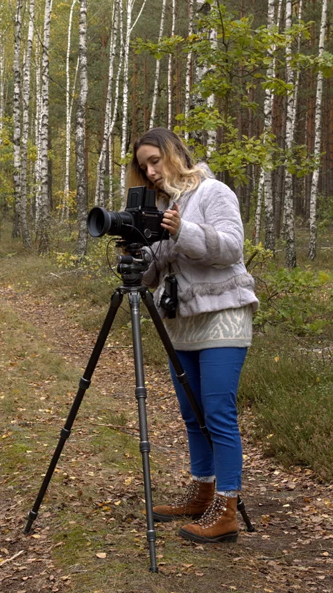 Woman using a classic analog camera. Stock Footage 342348139