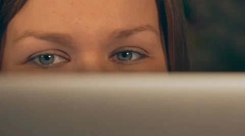 Woman using computer close-up. The camera slowly moves to the left. Video stock 58280111