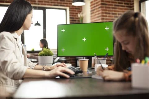 Woman using computer with greenscreen Stock Photos