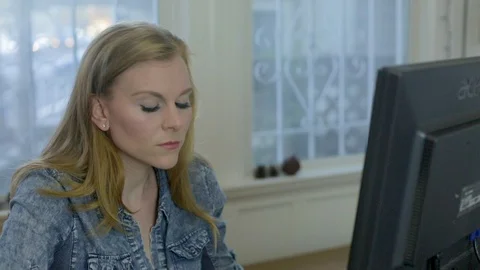 Woman using computer at home Stock Footage 89560333