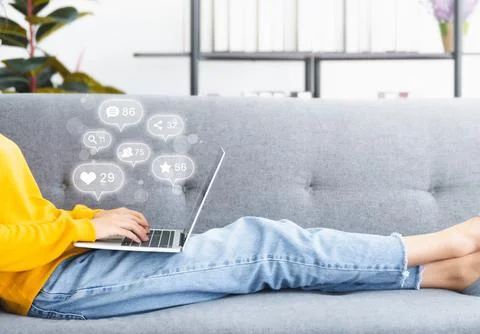 Woman using computer laptop with icon social media and social network. Online Stock Photos