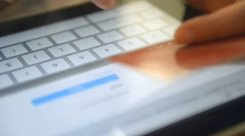 Woman using computer for on line purchase with credit card Stock Footage 42114314