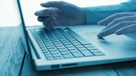 Woman using computer for on line purchase with credit card. Stock Footage 51650968